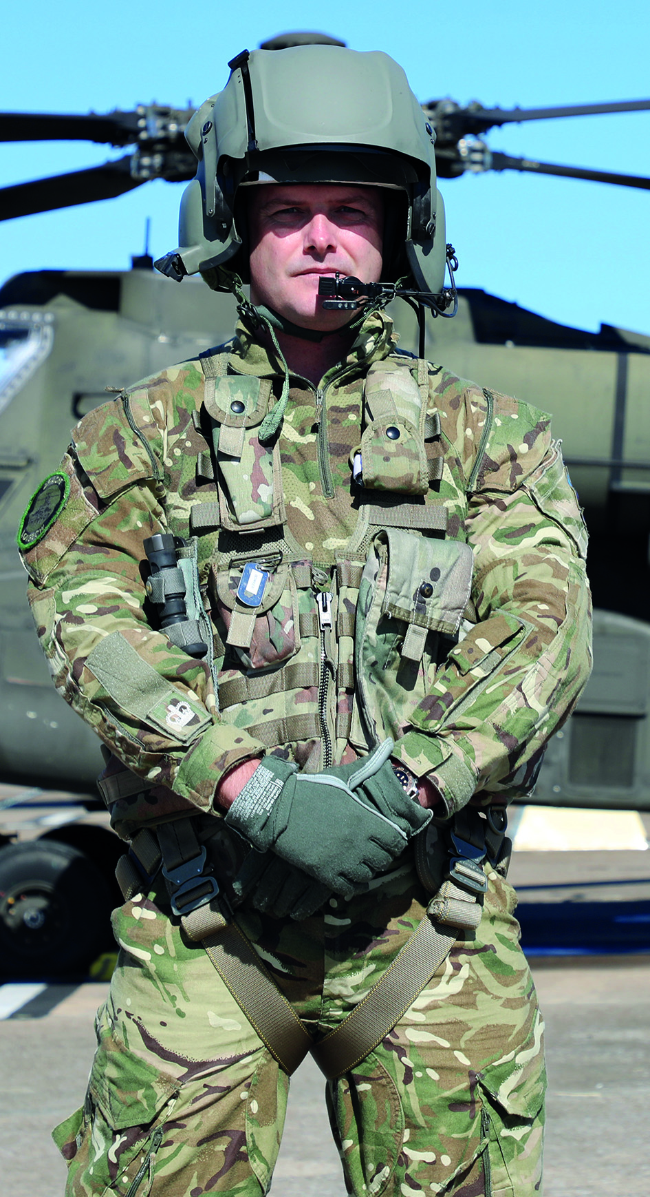 WO2 Mark Bowker AAC in front of helicopter