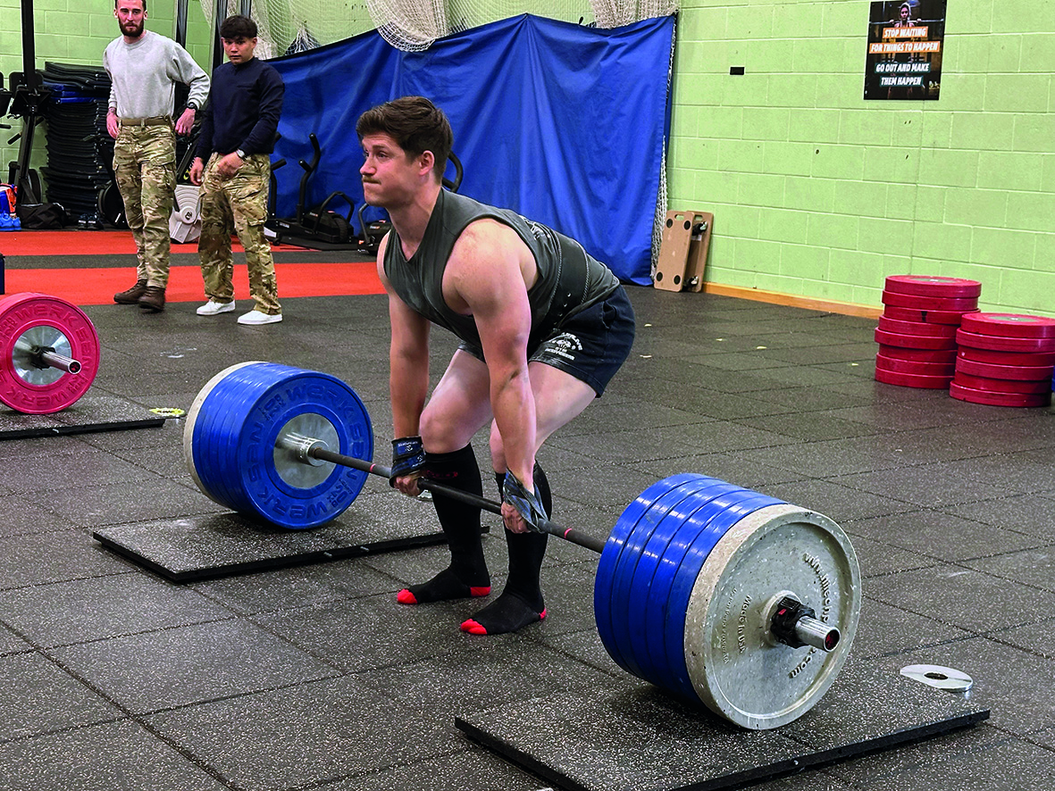 Strongman attempting to lift heavy weights